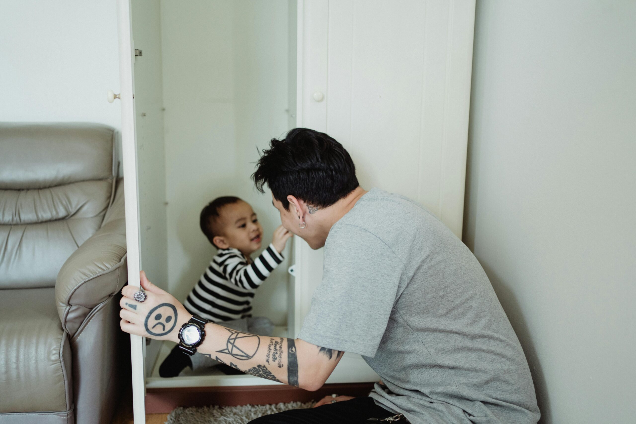 Caregiver and child doing serve and return interaction through play, supporting cooperation and emotional regulation